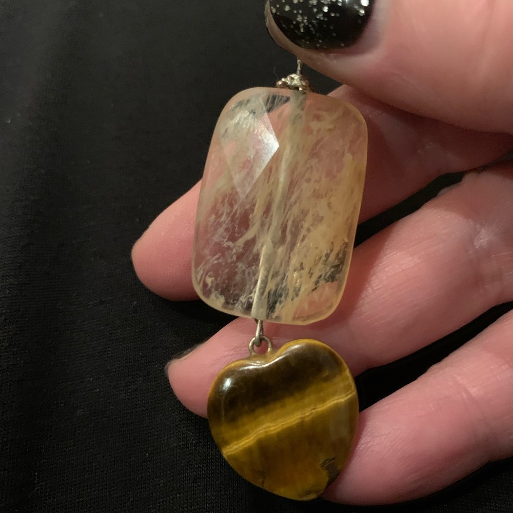 Rutilated quartz and a tigereye heart combine for a striking pendant. 2.75” - Picture 4 of 5
